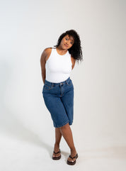 Women's two-layer no-bra tank top with built-in support and flattering silhouette.