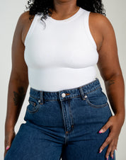 Women's two-layer no-bra tank top with built-in support and flattering silhouette.